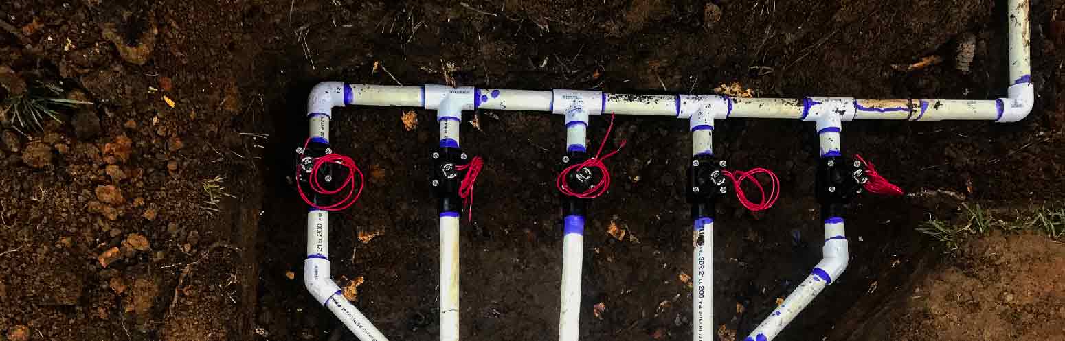 Irrigation line being installed in a lawn