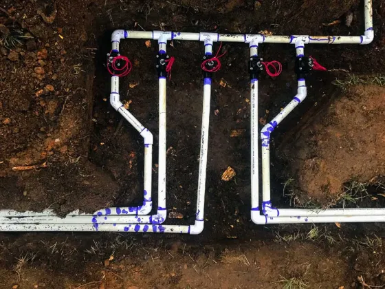 Underground irrigation manifold exposed