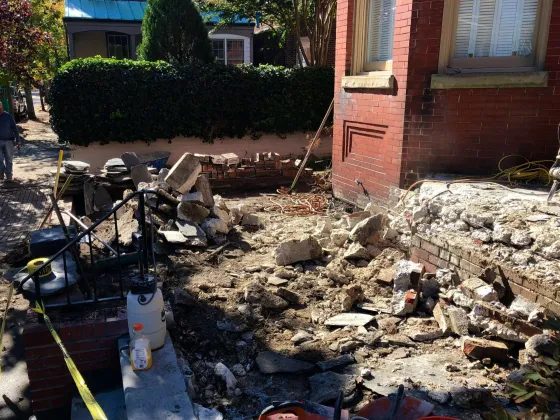 Initial demolition of existing patio at same residence