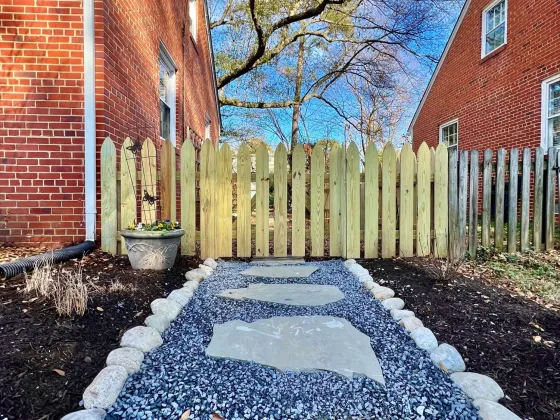 Blue stone stepping stones with decorative rocks