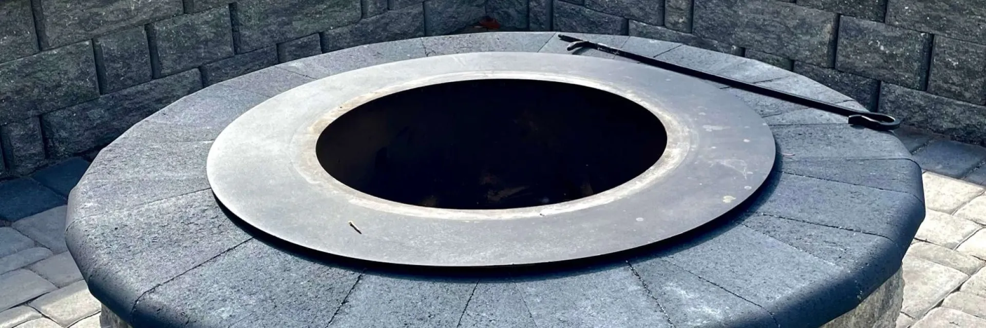 Close up of fire pit at same residence